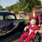 Resident enjoying the car show at Blue Valley Lutheran Homes